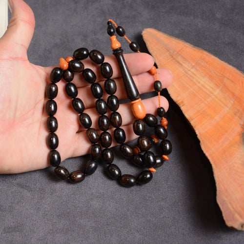 أبانوس مع خشب وحيد القرن