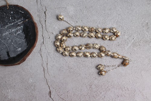 سبحة ماموث في قفص فضة