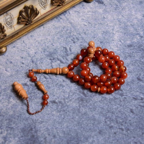 سبحة عقيق أحمر مع الكوك البرازيلي