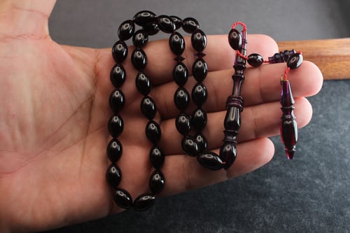 سبحة عنبر كهرمان بنفسجي غامق