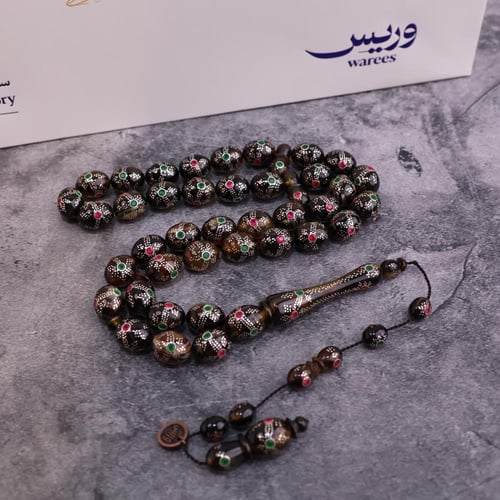 ظهر سلحفاة فضة و زمرد وياقوت