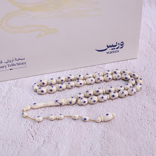 قطعة فاخرة من عاج الفيل مع حجر اللازورد