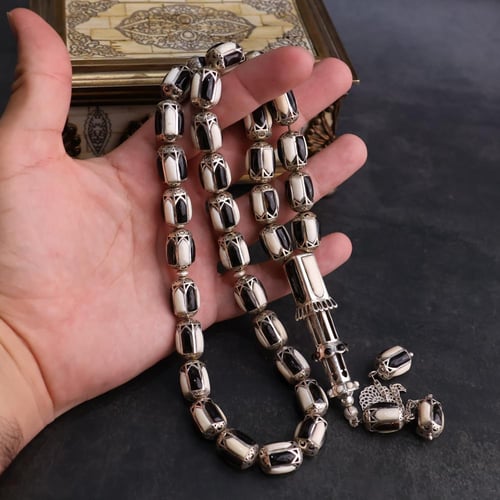 قفص فضة المرجان الأسود مع ناب الفيل