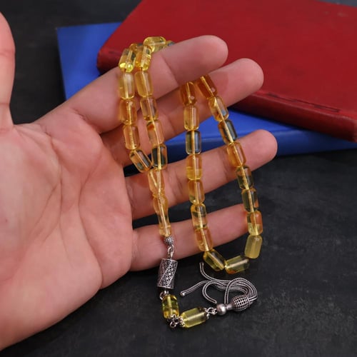 كهرمان طبيعي شفاف كركوشة فضة