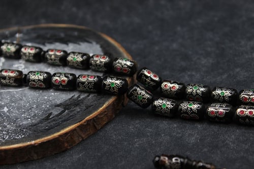 مسباح ظهر سلحفاة مع زمرد وياقوت