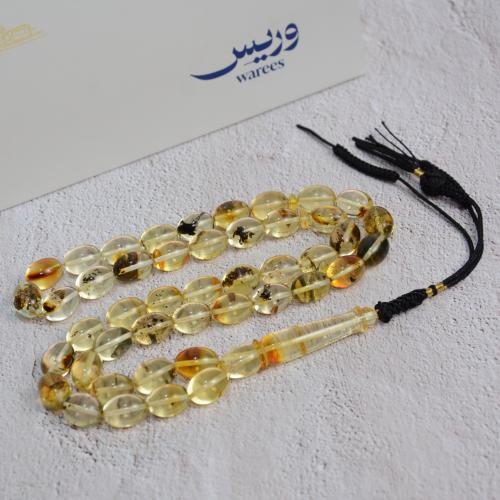 سبحة كهرمان شفاف شوائب