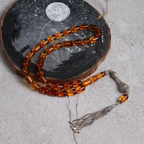 سبحة كهرمان شفاف طبيعي كركوشة فضة