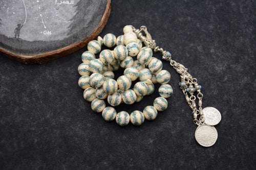 مسباح عاج مع الفيروز والفضة