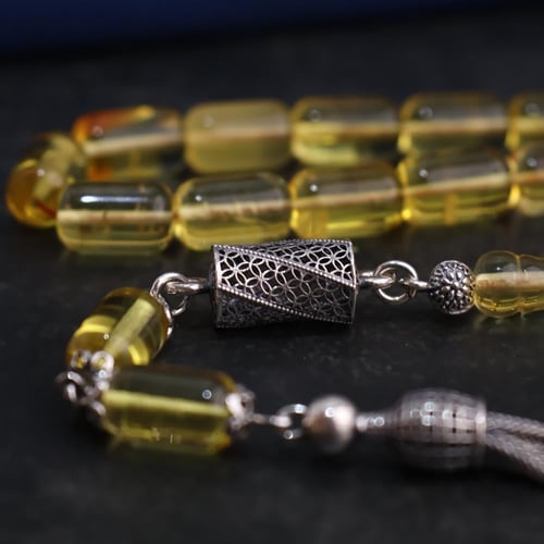 كهرمان طبيعي شفاف كركوشة فضة