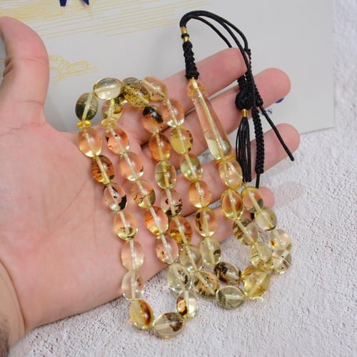 سبحة كهرمان شفاف شوائب