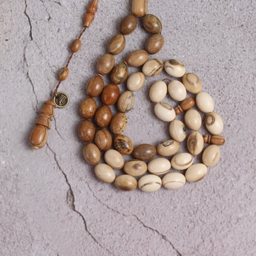 سبحة عاج ماموث مدرج ومشخط