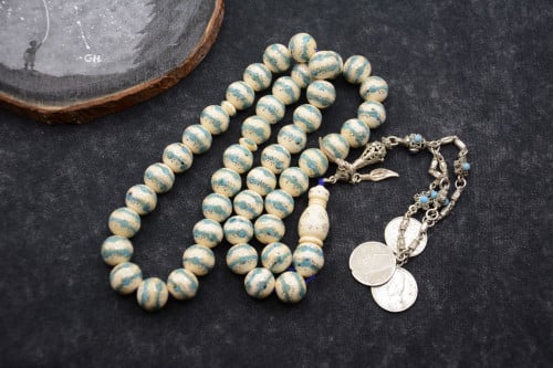 مسباح عاج مع الفيروز والفضة