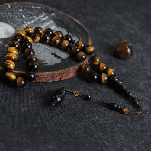 سبحة حجر عين النمر مع خشب الأبانوس