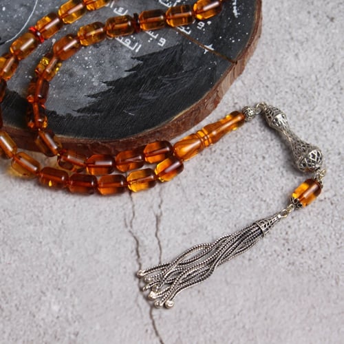 سبحة كهرمان شفاف طبيعي كركوشة فضة