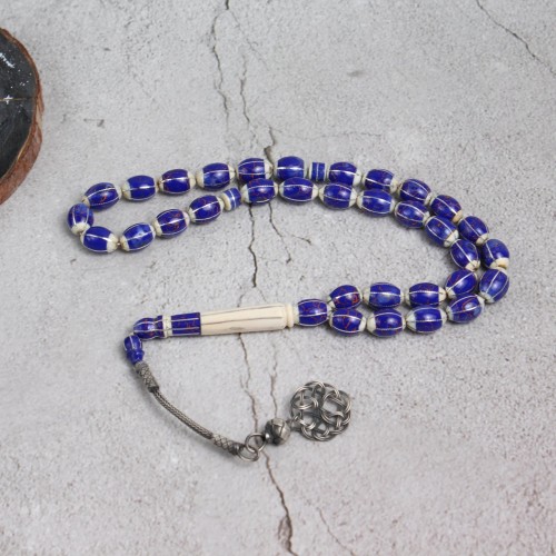 عاج فيل مع حجر اللازورد ( لابيس )