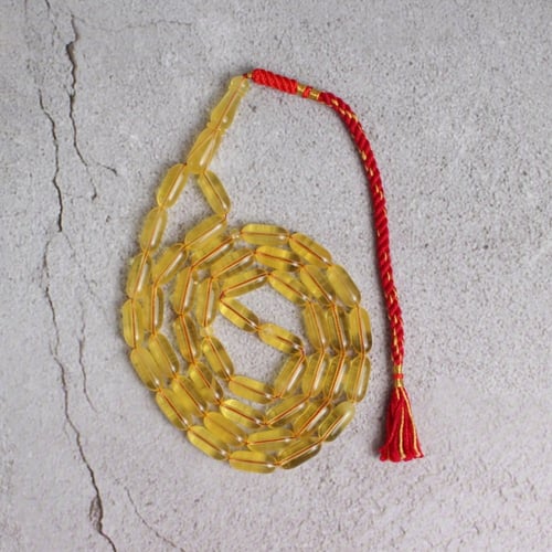 سبحة كهرمان صنوبري شفاف