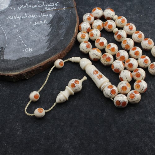 سبحة فاخرة من عاج الفيل والكهرمان