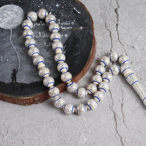 عاج فيل مع حجر اللازورد والفضة