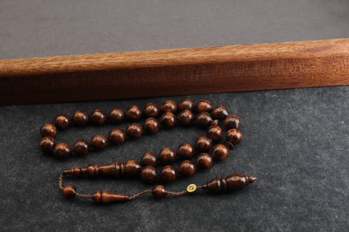 مسباح من خشب الثعبان النادر