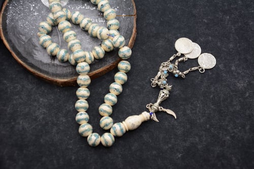 مسباح عاج مع الفيروز والفضة