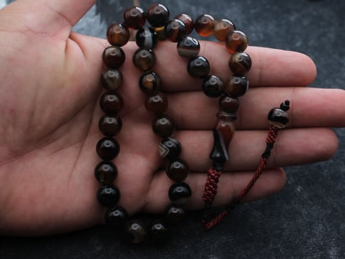 سبحة عقيق حجازي شكه حمراء