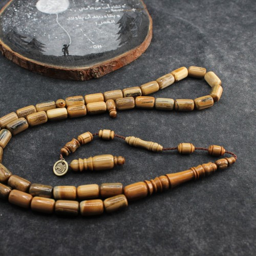 سبحة مميزة من ناب الماموث المنقرض