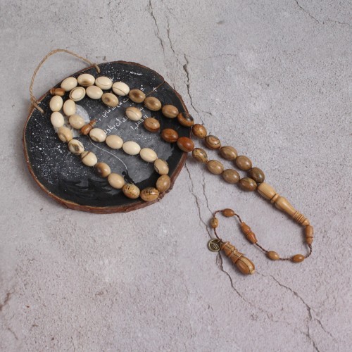 سبحة عاج ماموث مدرج ومشخط