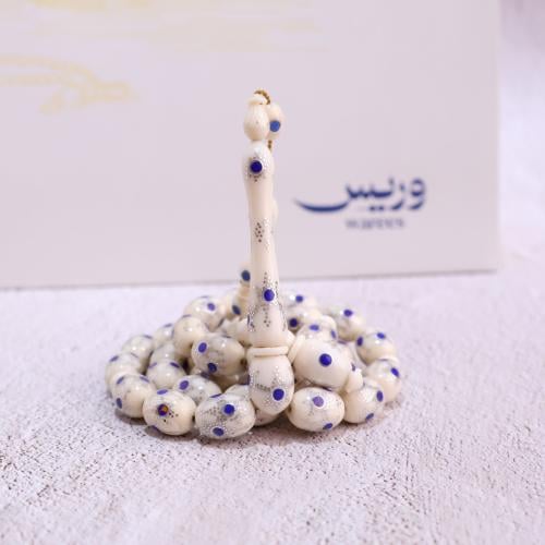 قطعة فاخرة من عاج الفيل مع حجر اللازورد