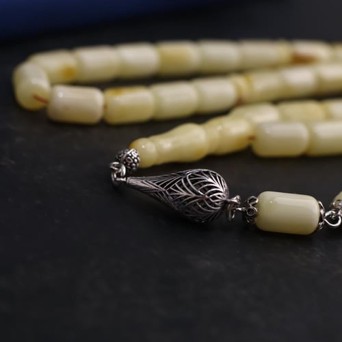 كهرمان طبيعي طباشيري كركوشة فضة