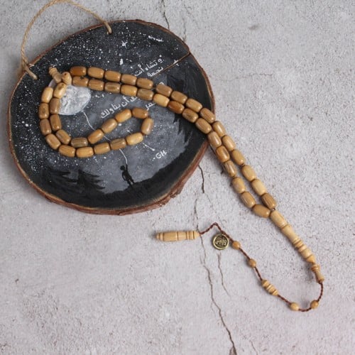 سبحة مميزة من ناب الماموث المنقرض