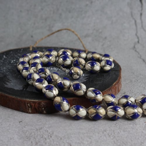 سبحة قفص فضة مع حجر اللازورد وناب الماموث