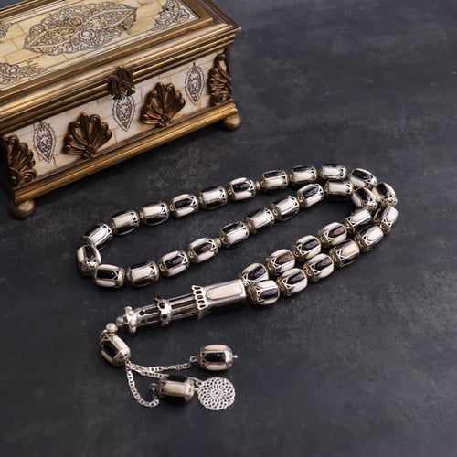 قفص فضة المرجان الأسود مع ناب الفيل