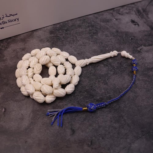 عظم جمل منقوش كركوشة