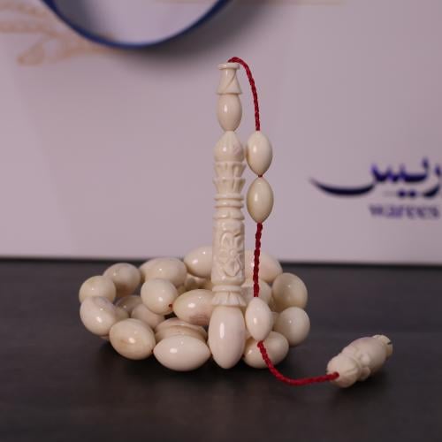 سبحة عظم جمل شاهد منقوش