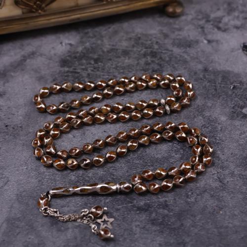 قفص فضة مع الكهرمان الروسي