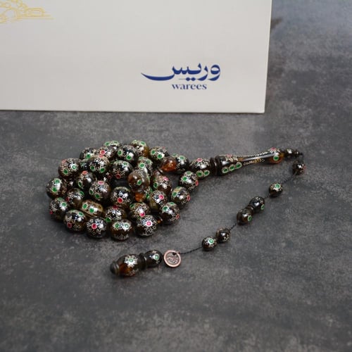 مسباح ظهر سلحفاة مع زمرد وياقوت