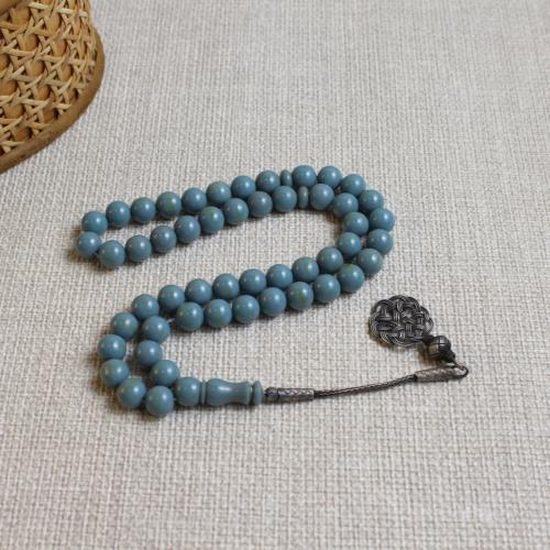 فاتوران لون فيروزي مع طرابزونة فضة