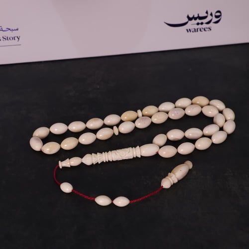 سبحة عظم جمل شاهد منقوش