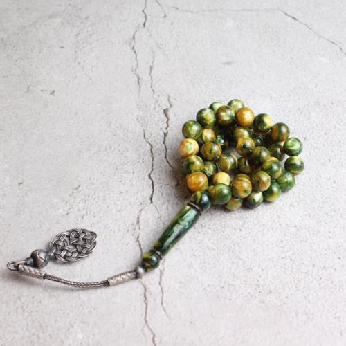 سبحة بكلايت فستقي مع طرابزونة فضة