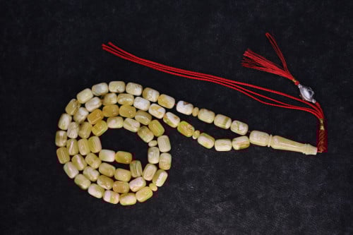 سبحة استثنائية من الكهرمان لوقو