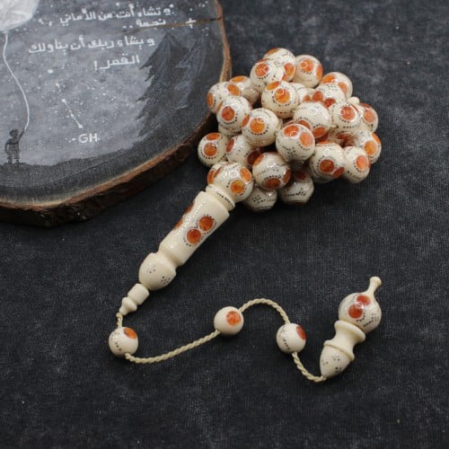 سبحة فاخرة من عاج الفيل والكهرمان