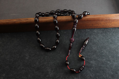 سبحة عنبر كهرمان بنفسجي غامق