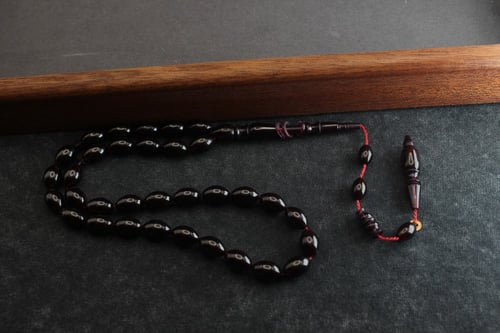 سبحة عنبر كهرمان بنفسجي غامق