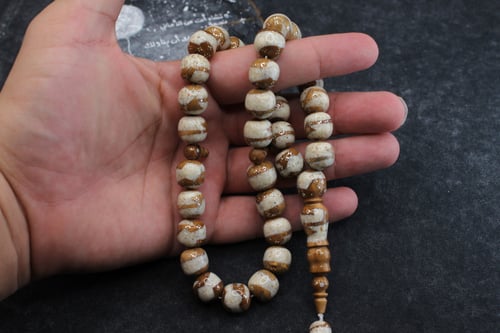 سبحة مميزة من العاج و الكوك