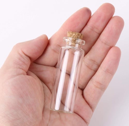 علب زجاجية بغطاء صغيرة-(12 قطعة)