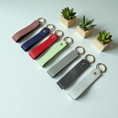 ميدالية جلد سادة /1قطعة