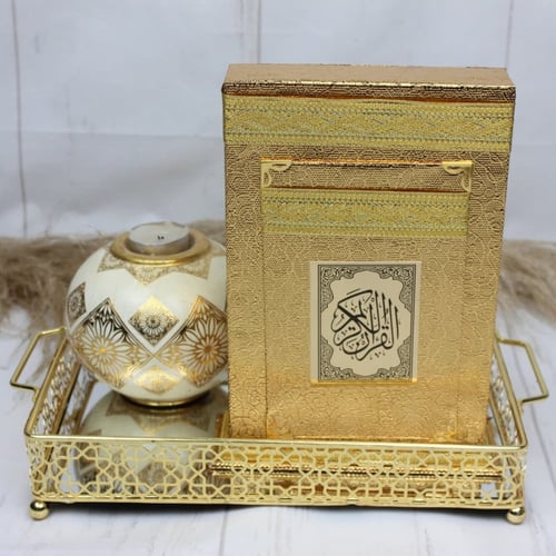 مصحف هدية ذهبي