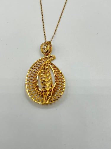 نص طقم عيار 21