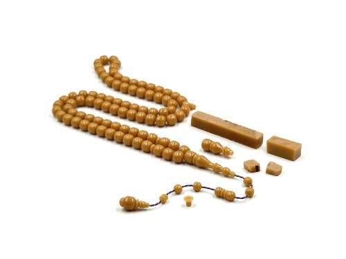 A rosary made of old-fashioned pipe, toffee casting, Yusuf Jamal's art factory.
