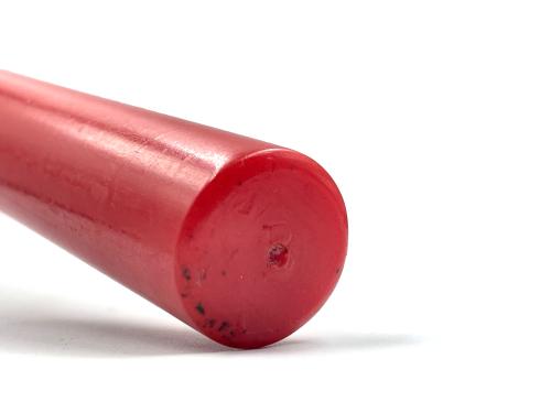 Red bakelite sticks with pink lid, old cast